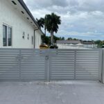 Metal gate for a residence